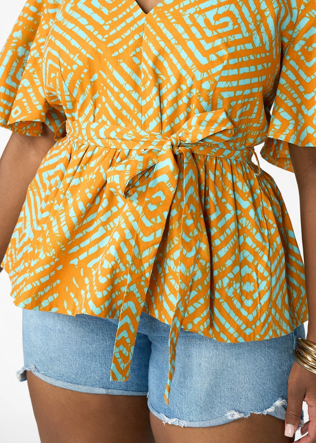 Hamama Women's African Print Peplum Blouse (Orange Blue Adire) - Image 2