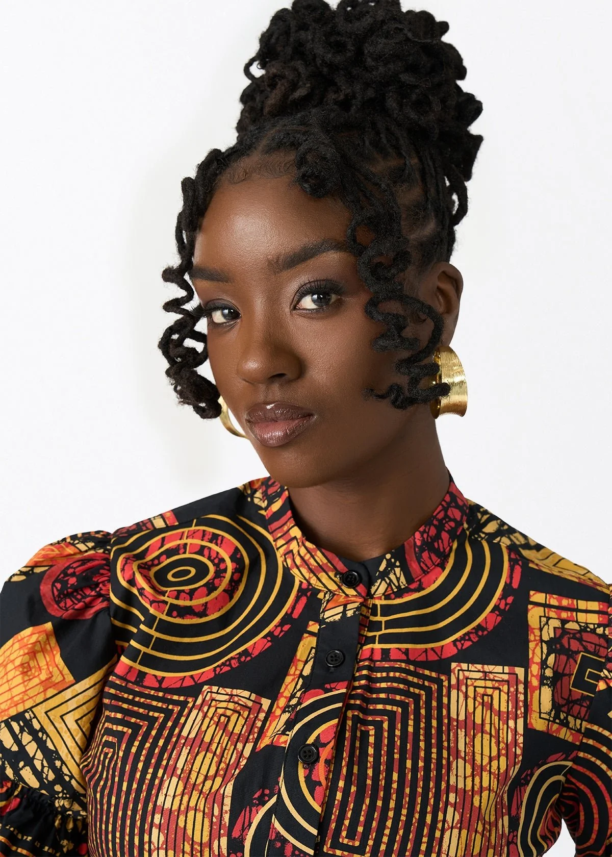 Manyara Women's African Print Peplum Blouse (Black Cinnamon Geometric) - Image 4
